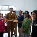 Pj Bupati Muarojambi Bersama Ketua TP PKK Memberi Bantuan Korban Angin Puting Beliung