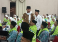 PJ Bupati Muarojambi Melepas 146 CJH Untuk Berangkat ke Tanah Suci