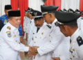 Gubernur Jambi Hadiri Pengukuhan Perpanjangan Masa Jabatan Kepala Desa dan Ketua TP-PKK Desa Kabupaten Muarojambi
