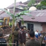 Pagar tembok SMK 1 Kota Jambi di Lorong Masjid Darussabil. (Juan)